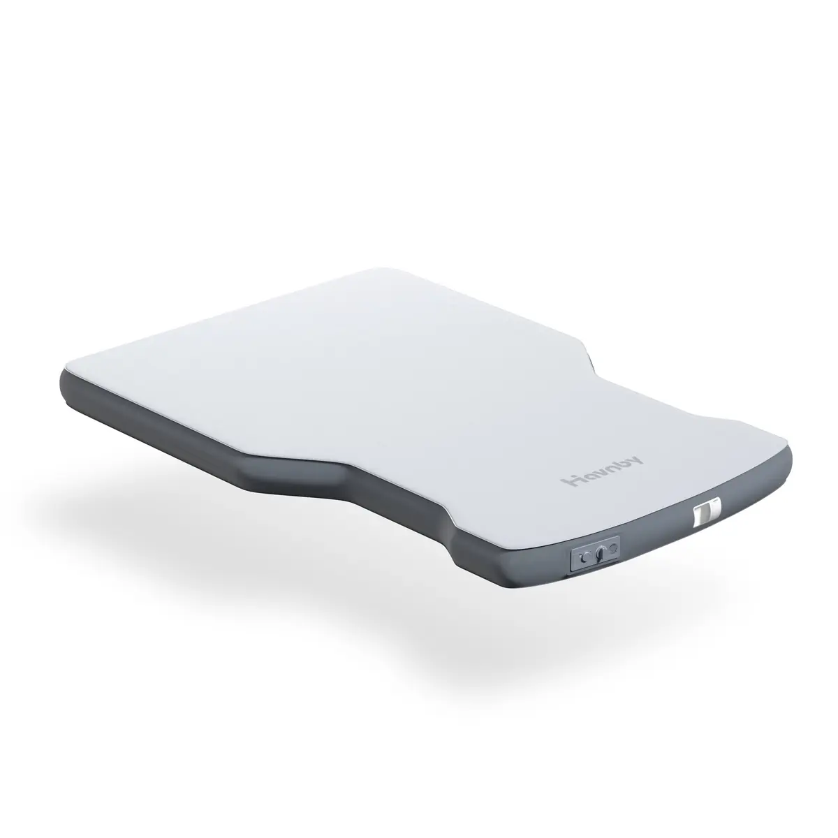 Havnby CloudCore mattress shown at an angle on a white studio background, showing the built-in pump controls at one end