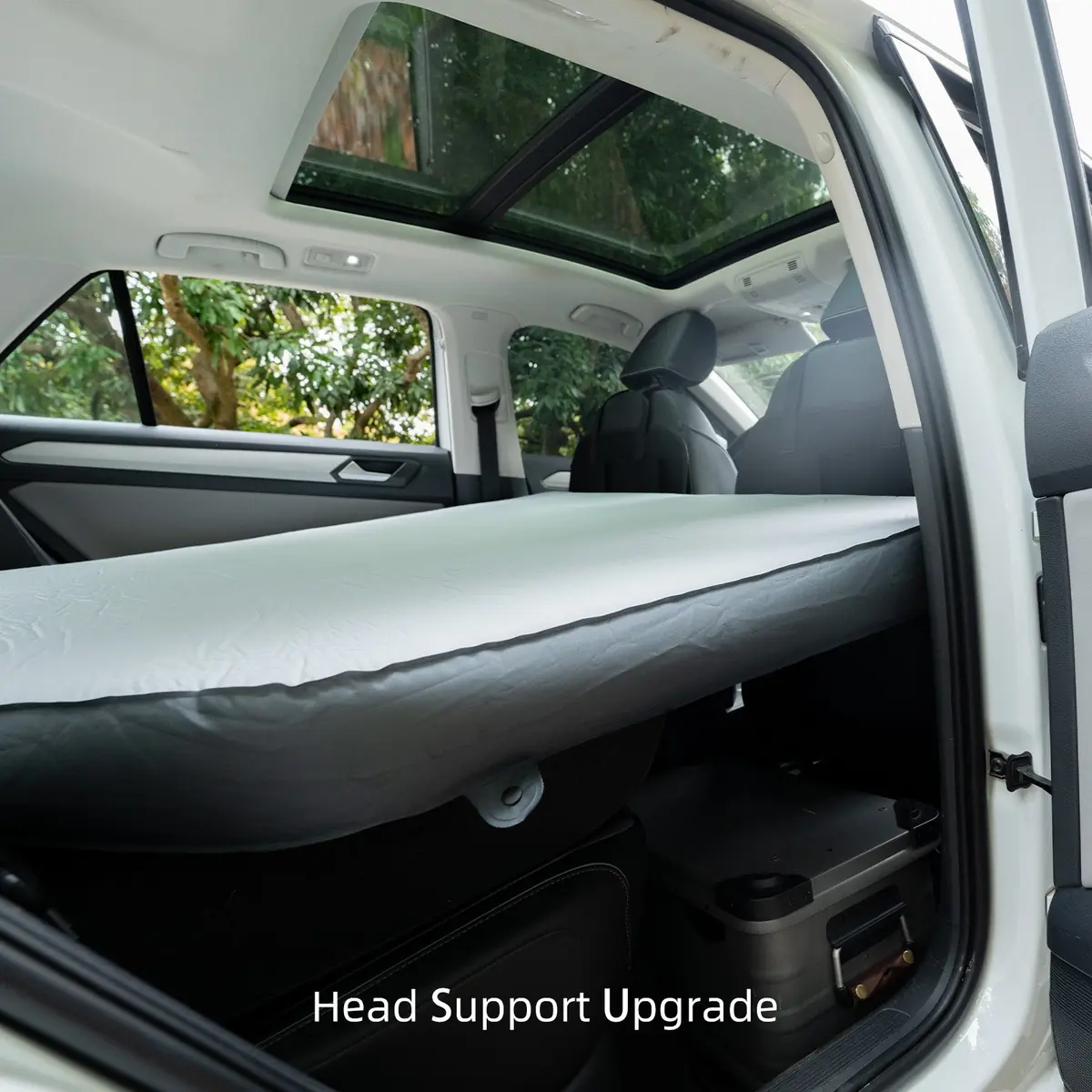 Havnby CloudCore mattress viewed through an open rear door with the sunroof visible overhead