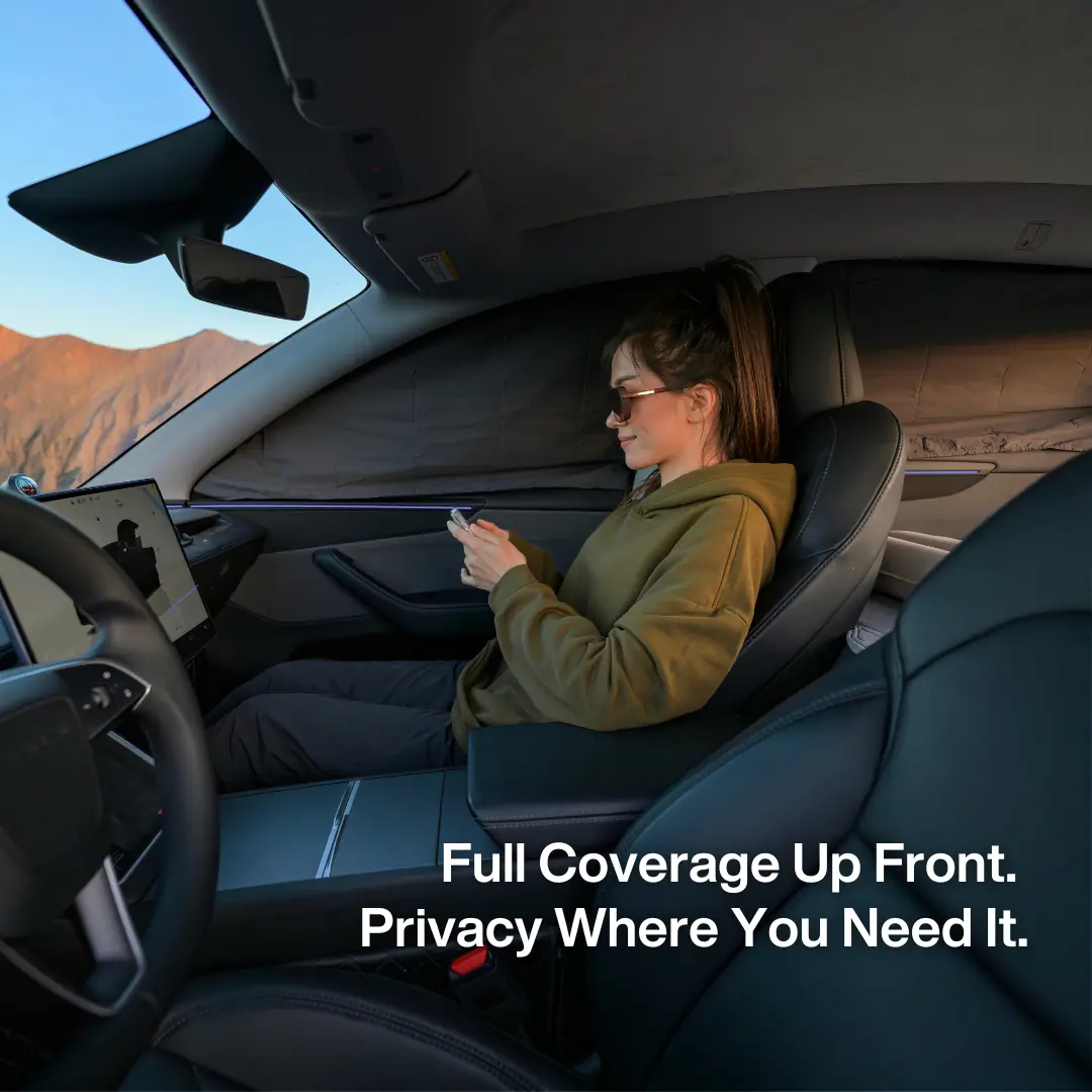 Havnby DreamShade window shades covering the windshield and front side windows inside a Tesla Model Y interior