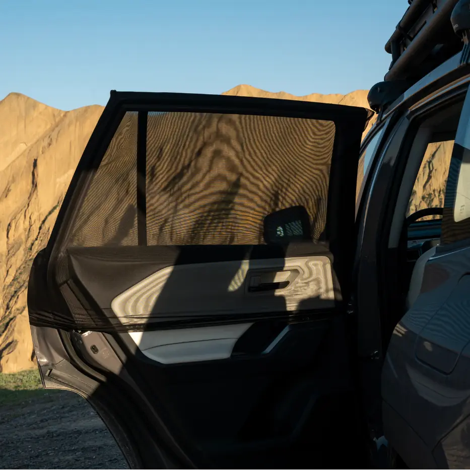 Havnby DreamShade car window mesh screen installed over an open rear door