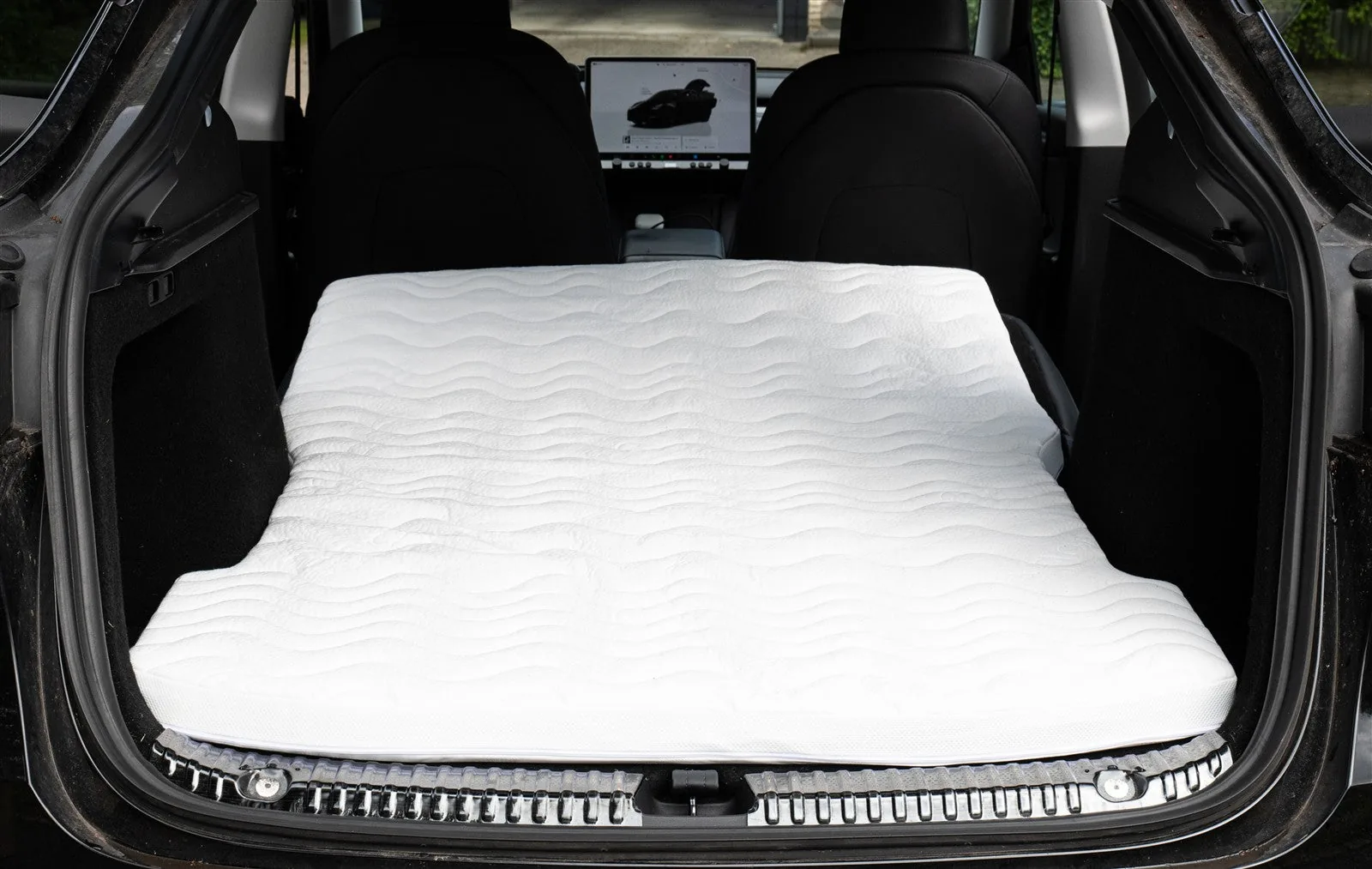 2befair camping mattress installed in a Tesla interior in an official Shop4Tesla photograph