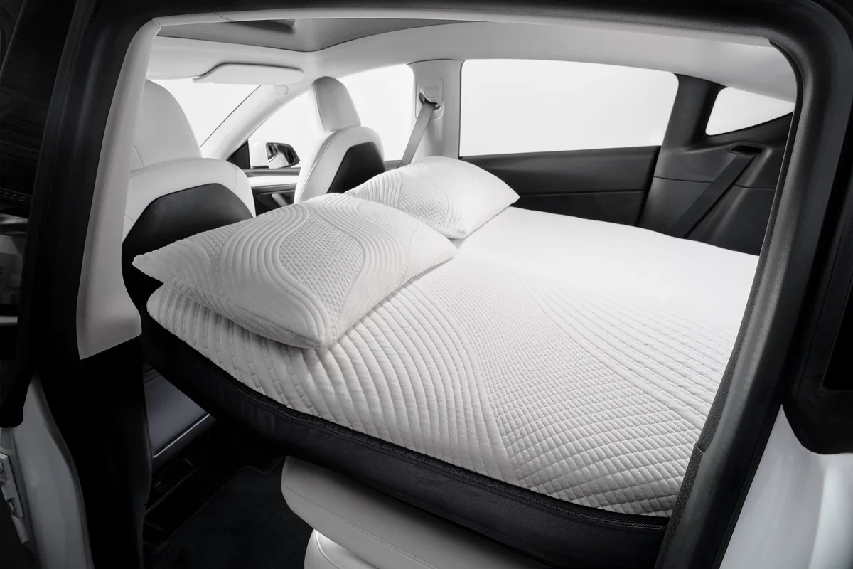 Snuuzu mattress installed across the rear of a Tesla Model Y