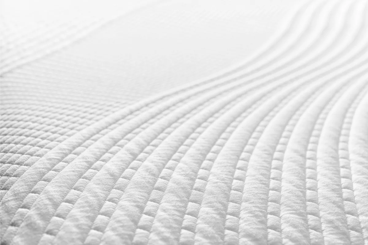 Close-up of the quilted Snuuzu Lyocell mattress cover