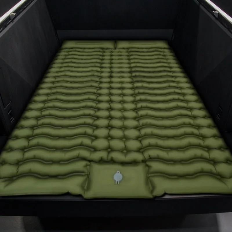 Dark Green Teskay camping mattress installed in a Tesla Cybertruck bed